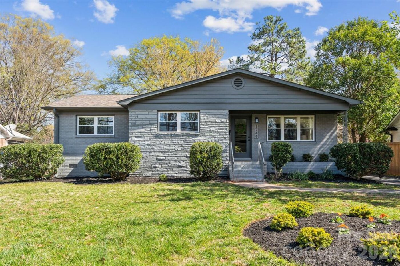 Renovated Charlotte ranch home with fresh exterior and landscaping